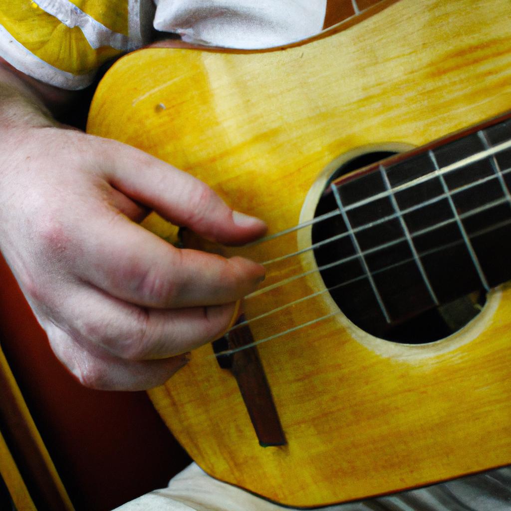 Person playing traditional Irish instrument